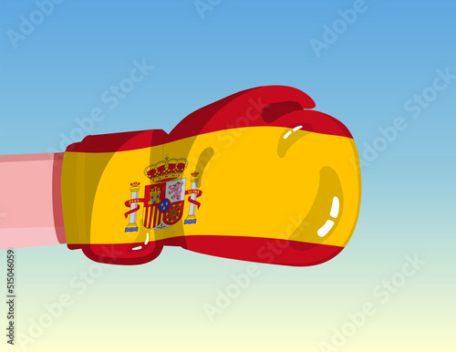 Flag of Spain on boxing glove. Confrontation between countries with competitive power. Offensive attitude. Separation of power. Template ready design.