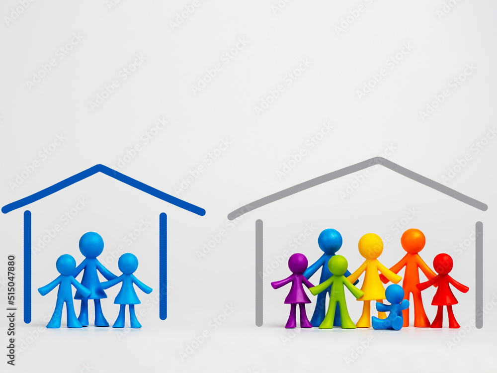 Figurines of colorful people on a light background. The concept of a traditional family. LGBT Community Figurines of colorful people on a light background. The concept of a traditional family. LGBT Community