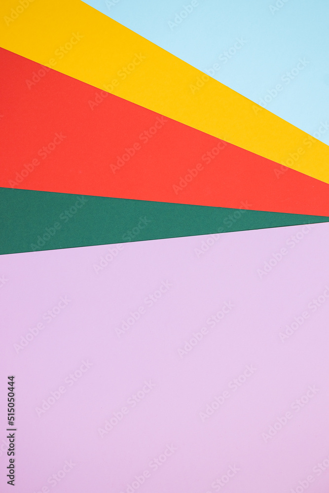 Bright multicolored rainbow paper background. Geometric. Vivid colors layout. Abstract colorful texture layout