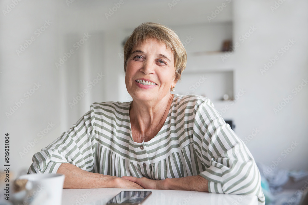Portrait of positive senior woman with dental braces posing indoors. Copy space. eldrey woman smile with Brackets . Portrait of positive senior woman with dental braces posing indoors. Copy space. eldrey woman smile with Brackets .