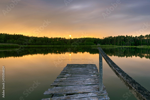 Beautiful summer evening on the lake at sunset  summer evening landscape on the lake and in the forest