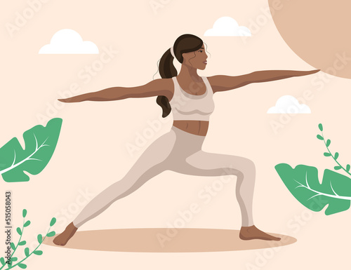 Black slim woman standing Warrior Pose, exercising in a beautiful environment