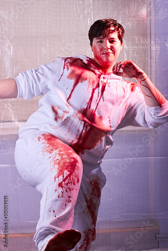 Fotografie Transgender man sexy cannibal murderer covered in blood