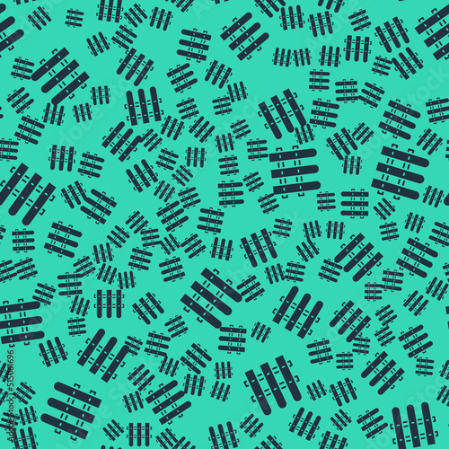 Black Garden fence wooden icon isolated seamless pattern on green background. Vector