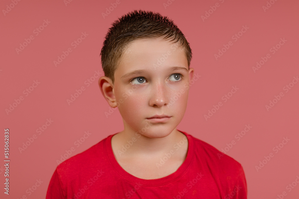 portrait of a boy with a sweaty pink face and wet hair on a colored background portrait of a boy with a sweaty pink face and wet hair on a colored background