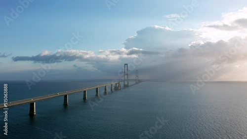 Aerial view on the famous Great Belt suspension bridge (Østbroen) in Denmark, a multi-element fixed link crossing the Great Belt strait between the Danish islands of Zealand and Funen photo