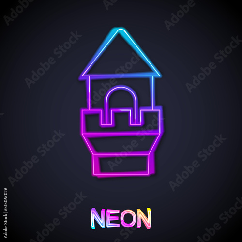 Glowing neon line Castle tower icon isolated on black background. Fortress sign. Vector