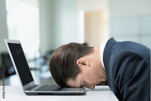 Young man tired from hard work relieve exhaustion pain and anxiety.
