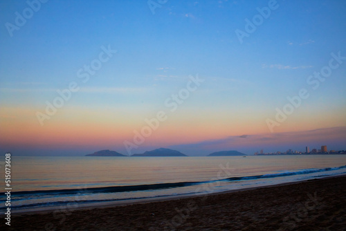 sunset in the sea with islands in the background of mazatlan sinaloa mexico