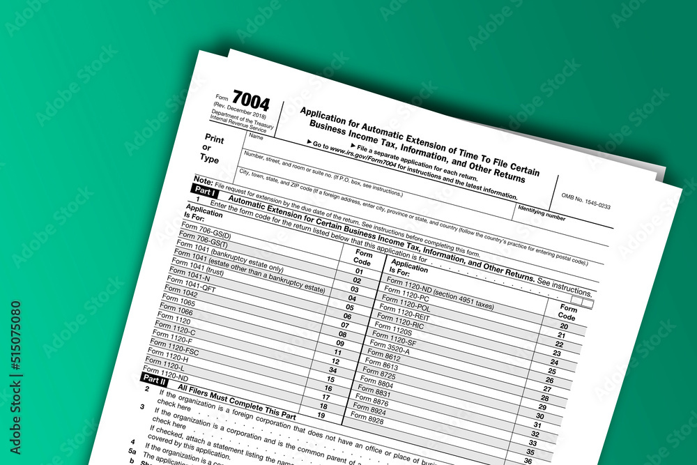 Form 7004 documentation published IRS USA 43263. American tax document on colored Form 7004 documentation published IRS USA 43263. American tax document on colored