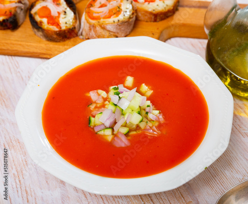 Traditional Andalusian cold soup gaspacho served with hot sandwiches © JackF