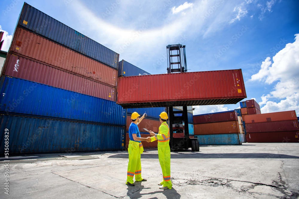 Group workers people in safety uniforms and hard hats work at logistics