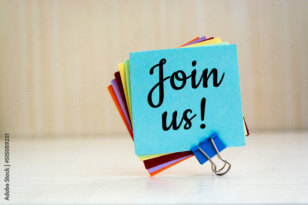 Join us written on a memo at the office. Join us written on a memo at the office.