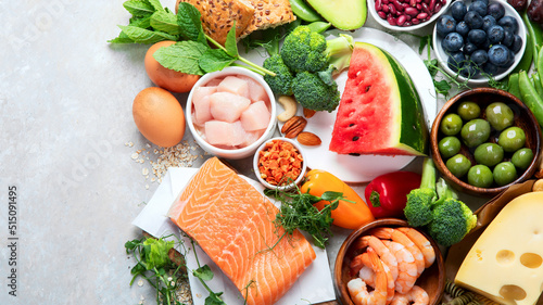 Healthy food assortment on light background.