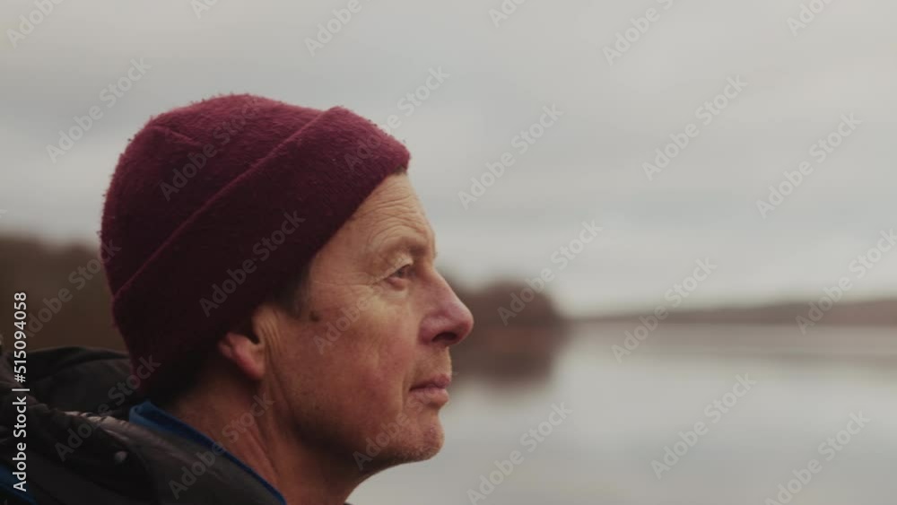 Close-up Portrait of Man Tourist Looking at Lake in Himmelbjerget Area, Denmark Close-up Portrait of Man Tourist Looking at Lake in Himmelbjerget Area, Denmark