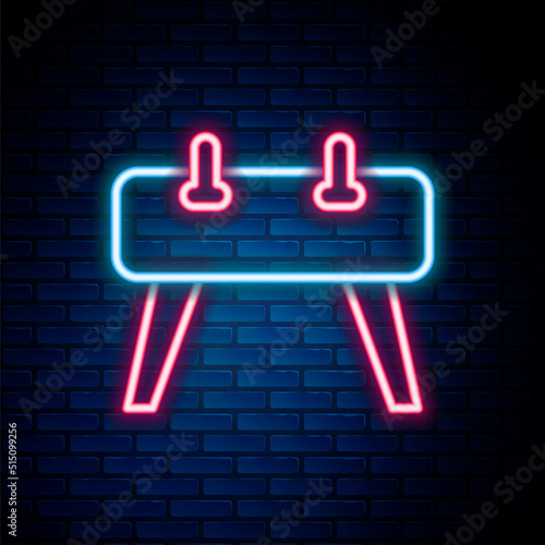 Glowing neon line Pommel horse icon isolated on brick wall background. Sports equipment for jumping and gymnastics. Colorful outline concept. Vector