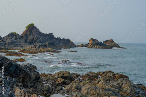 Big rocks formation in to the sea at om beach photo