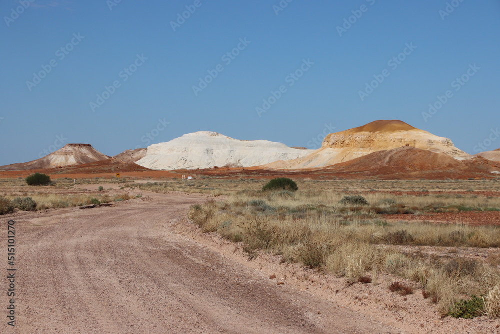 Dirt road in the Kanku-Breakaways Conservation Park near the remote outback opal mining town of Coober Pedy, South Australia.