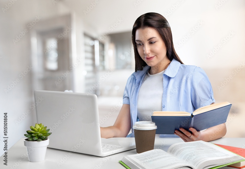 Happy Business Lady Using Laptop Posing Sitting At Workplace In Modern Office. Successful Entrepreneurship And Career Concept Happy Business Lady Using Laptop Posing Sitting At Workplace In Modern Office. Successful Entrepreneurship And Career Concept