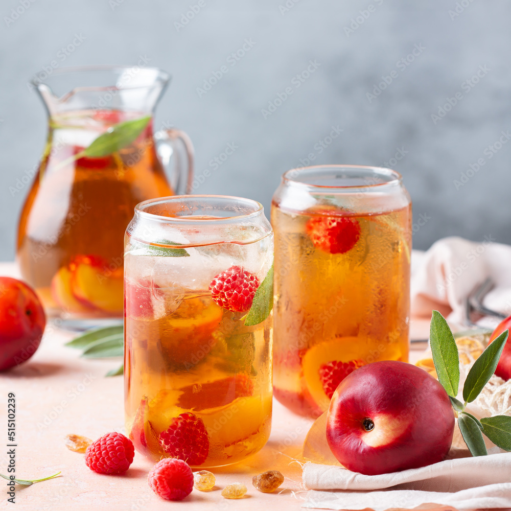 Peach raspberry iced tea, summer refreshing drink, beverage, cocktail Peach raspberry iced tea, summer refreshing drink, beverage, cocktail