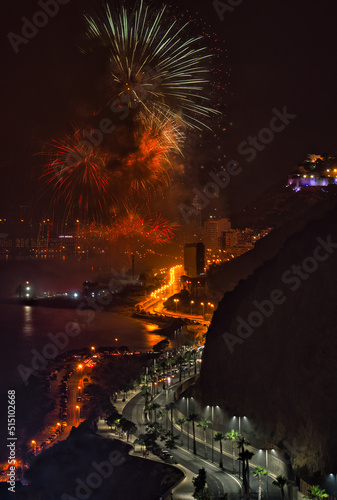 Views of Alicante city at night during the celebration of the night of San Juan, fireworks festival.