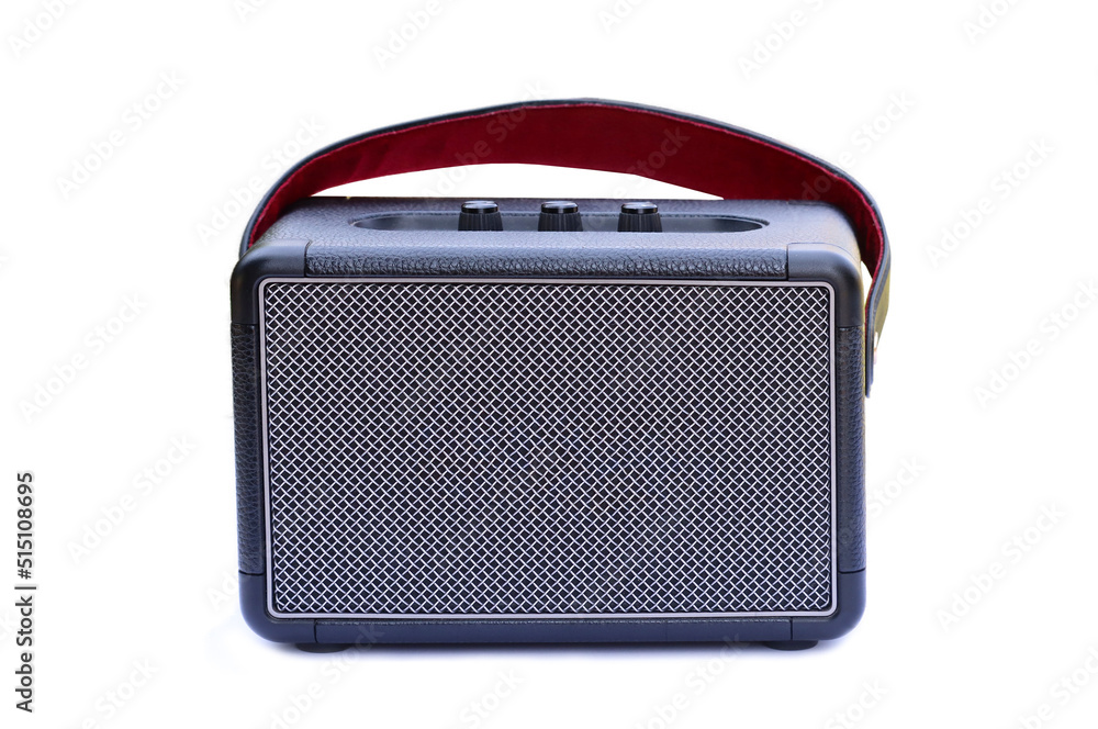Retro style Bluetooth speaker with volume knob and strong metal grille, ready to hold (speaker) isolated on white backgroundisolated Retro style Bluetooth speaker with volume knob and strong metal grille, ready to hold (speaker) isolated on white backgroundisolated
