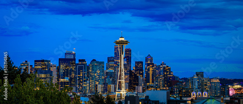 Sunset skyline panorama with the Space Needle and Mount Rainier in Seattle  WA