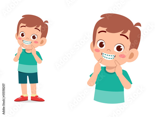 little kid using dental braces and feel happy