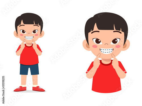 little kid using dental braces and feel happy