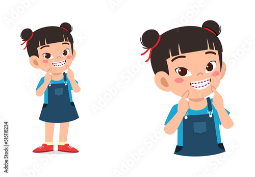 little kid using dental braces and feel happy