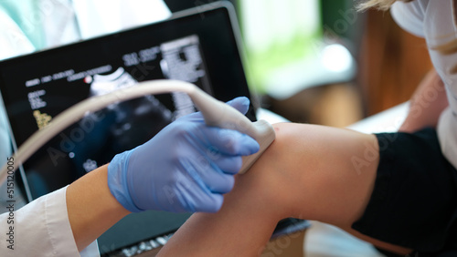 Ultrasound diagnostics of knee joint of little child