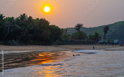 sunrise light reflecting on sand photo