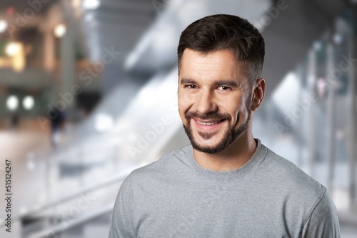 Happy positive millennial business man, company owner, startup leader, professional posing. Businessman indoor