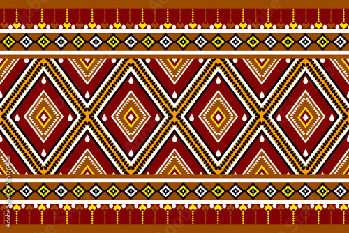 Ethnic patterns of yellow, brown, and red are designed using geometric patterns for sewing, embroidery, knitting, embroideries, and silk.