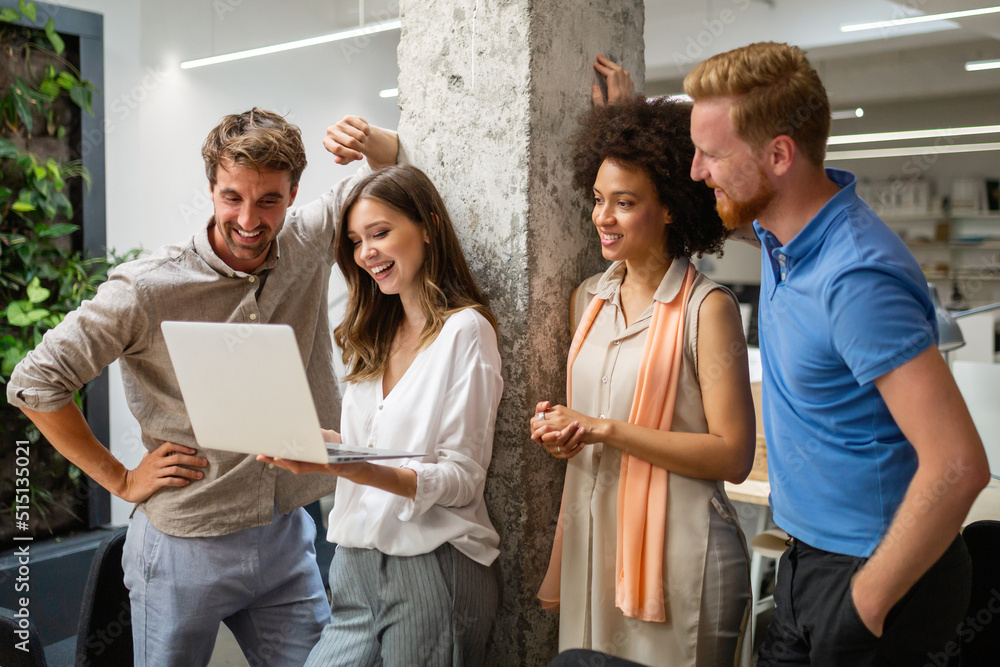 Group of happy multiethnic business people having fun and chatting at workplace office Group of happy multiethnic business people having fun and chatting at workplace office