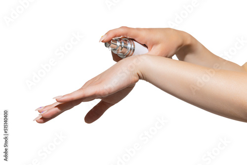 Closeup hands of unrecognizable woman applying organic moisturising lotion isolated on white background. Cosmetics, skin care, anti-aging treatments