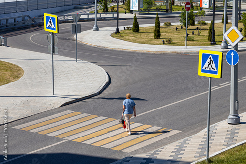  the pedestrian crosses the road