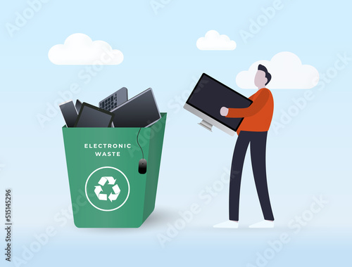 Electronics Recycling and Waste Management concept. The character carries an electronic device - a monitor or a computer - into a trash recycling bin full of electronic devices with e-waste logo sign photo
