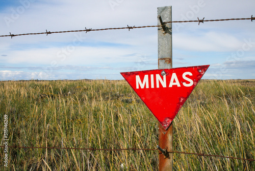 Photos Warning poster of the minefield