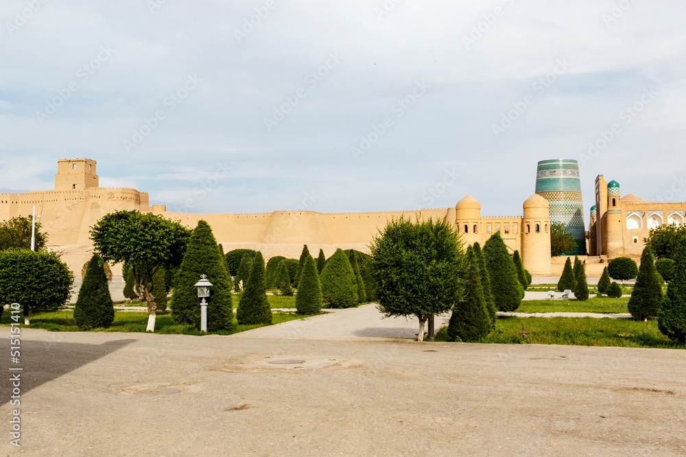 Kalta Minor minaret and city walls in Khiva, Uzbekistan, Central Asia