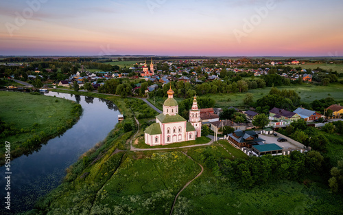 Aerial views of Russian Golden Ring town Suzdal on a sunrise (aerial drone photo). Suzdal, Russia