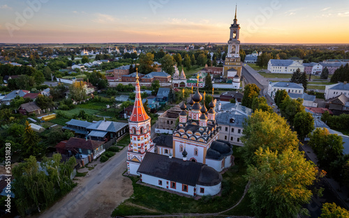 Aerial views of Russian Golden Ring town Suzdal on a sunrise (aerial drone photo). Suzdal, Russia