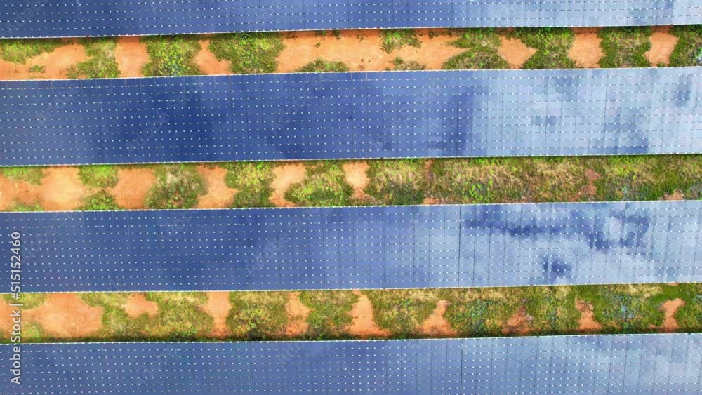 Aerial Top View of Solar Farm with Sunlight, Renewable Energy. Aerial Drone Footage Ecology Power Conservation Concept. Clean energy production in Thailand. drone footage. 4k
Aerial Top View of Solar Farm with Sunlight, Renewable Energy. Aerial Drone Footage Ecology Power Conservation Concept. Clean energy production in Thailand. drone footage. 4k