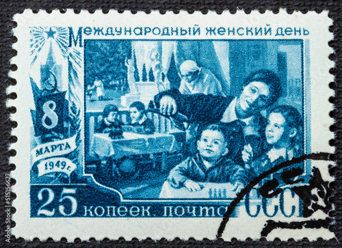 USSR - CIRCA 1949: stamp printed in the USSR shows a woman teacher with inscription International Women's Day March 8, 1949 from the series International Women's Day March 8 , circa 1949