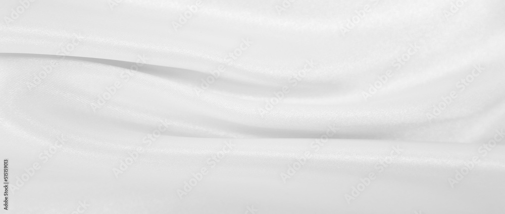 Smooth elegant white silk or satin luxury cloth texture as wedding background. Luxurious background design Smooth elegant white silk or satin luxury cloth texture as wedding background. Luxurious background design