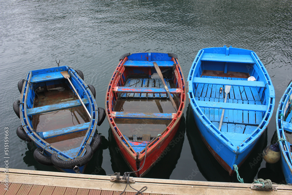 small weathered boats in Luarca