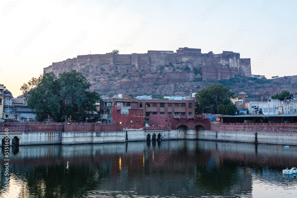 Pond in the center of Jodhpur with the Mehrangarh fortress in the background, Rajasthan, India, Asia