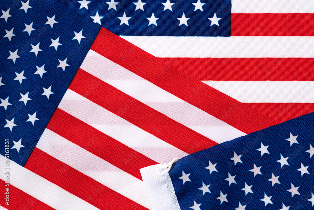Fototapeta premium Concept of Independence day or Memorial day. Flag over bright marble table background.