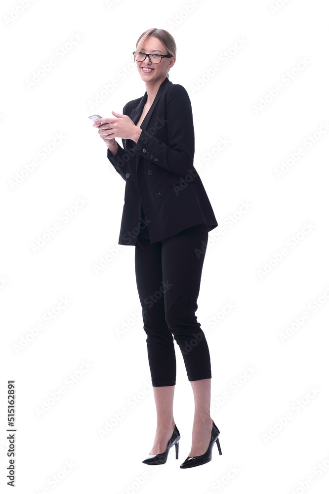 in full growth. businesswoman reading SMS on her smartphone in full growth. businesswoman reading SMS on her smartphone