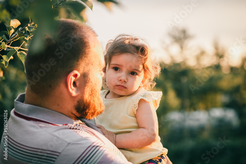 parent and child in sushine light 